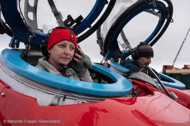 Dr Susanne Lockhart from the California Academy of Sciences and John Hocevar, Oceans Campaign Director for Greenpeace USA and submersible pilot, during preparation for a dive off Half Moon Island, Antarctica.