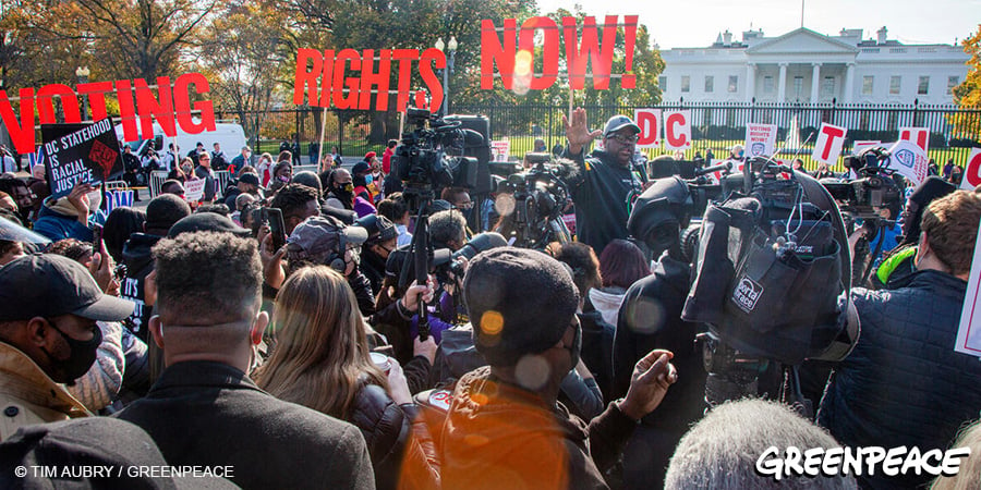 Activists protest in front of the White House during The No More Excuses: Voting Rights Now! Action.