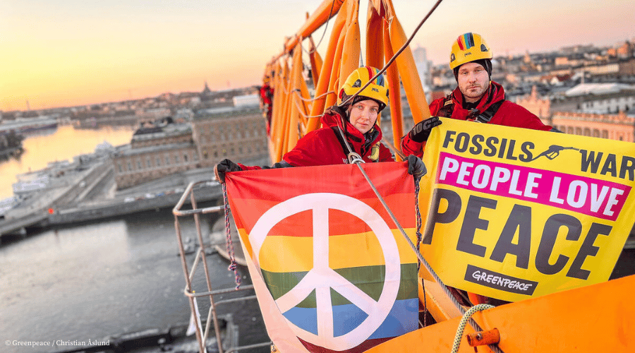 Peaceful Protest on Construction Crane near the Swedish Parliament in Stockholm